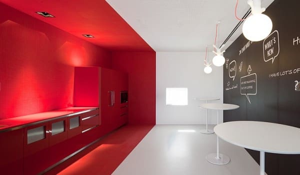 red-accent-wall-in-office-kitchen
