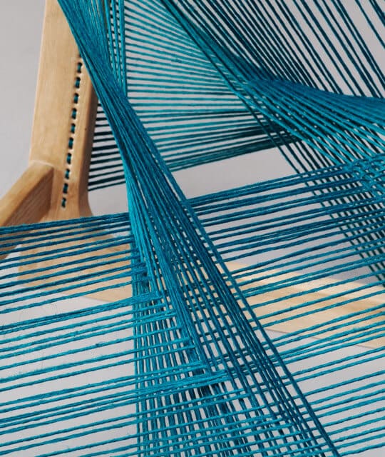 tuquoise-silk-threads-around-an-oak-frame