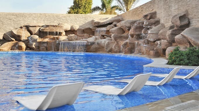 Water-Falls-pool-with-built-in-sunbeds