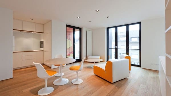 dining-room-with-white-and-orange-chairs