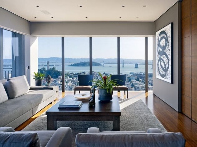 Modern-living-room-with-abstract-art-and-city-views