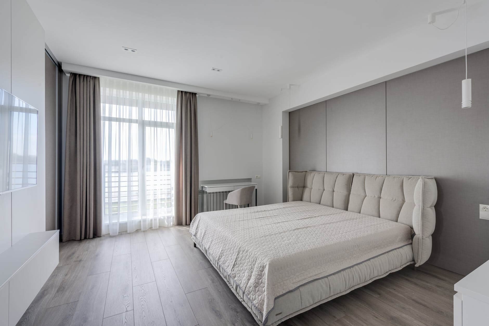 comfortable bedroom with light stylish interior