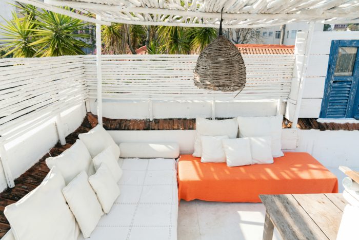 Balcony with a stylish wooden privacy screen providing seclusion.