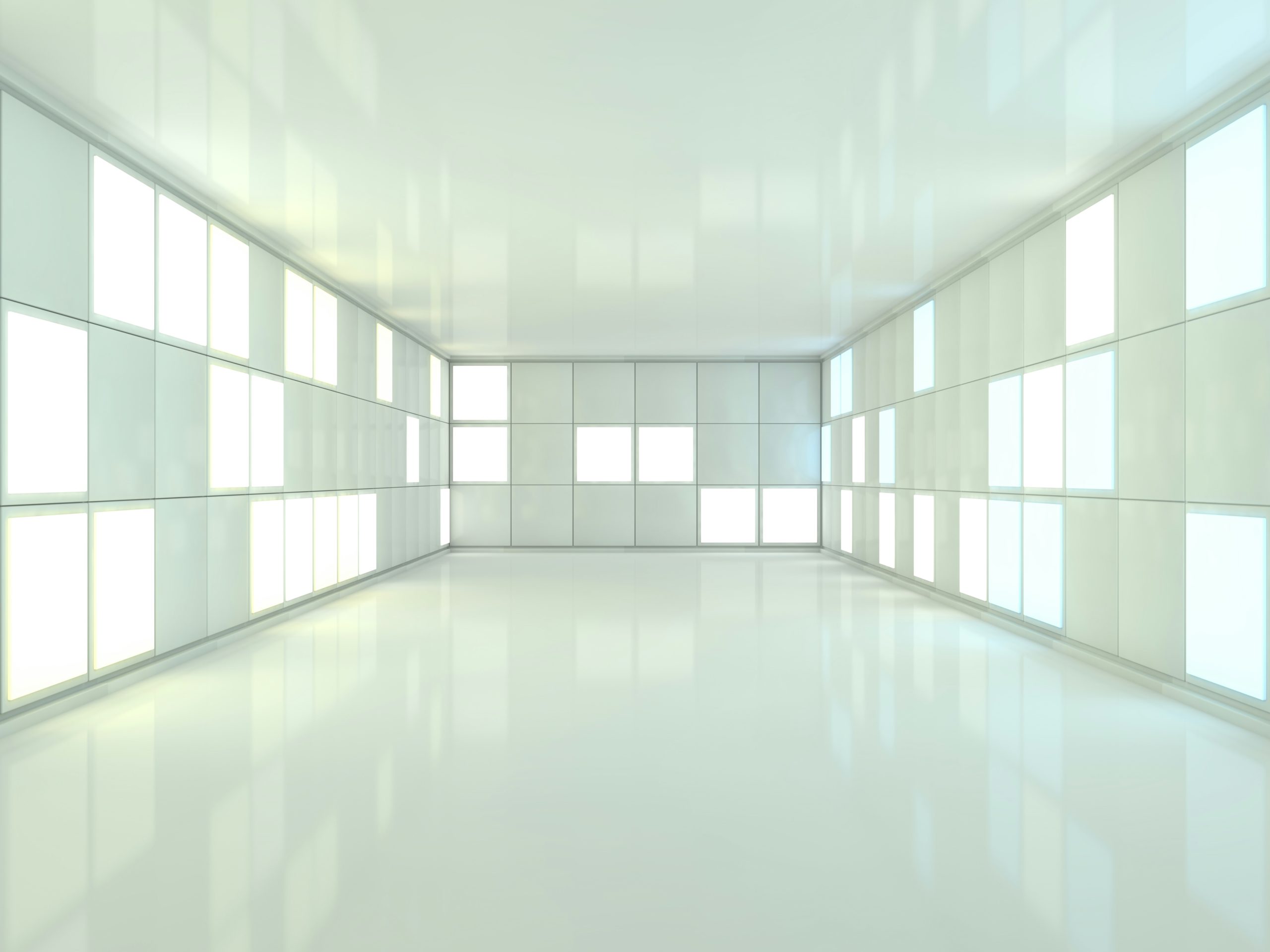 Bright, futuristic room with illuminated panels on the walls, featuring a clean and minimalist design with reflective surfaces.