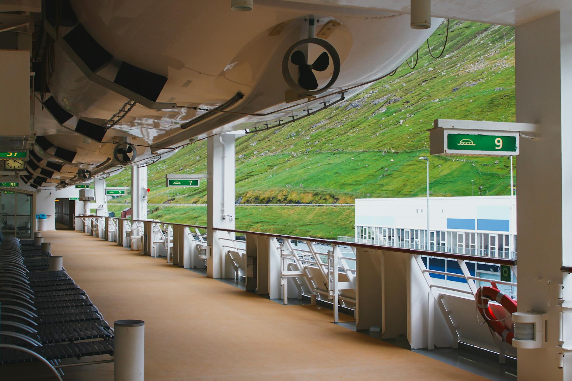 sunny day on faroese ferry deck with lifeboats