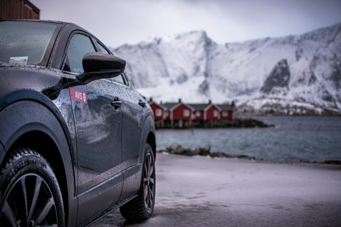 Couple enjoying romantic ride with private driver