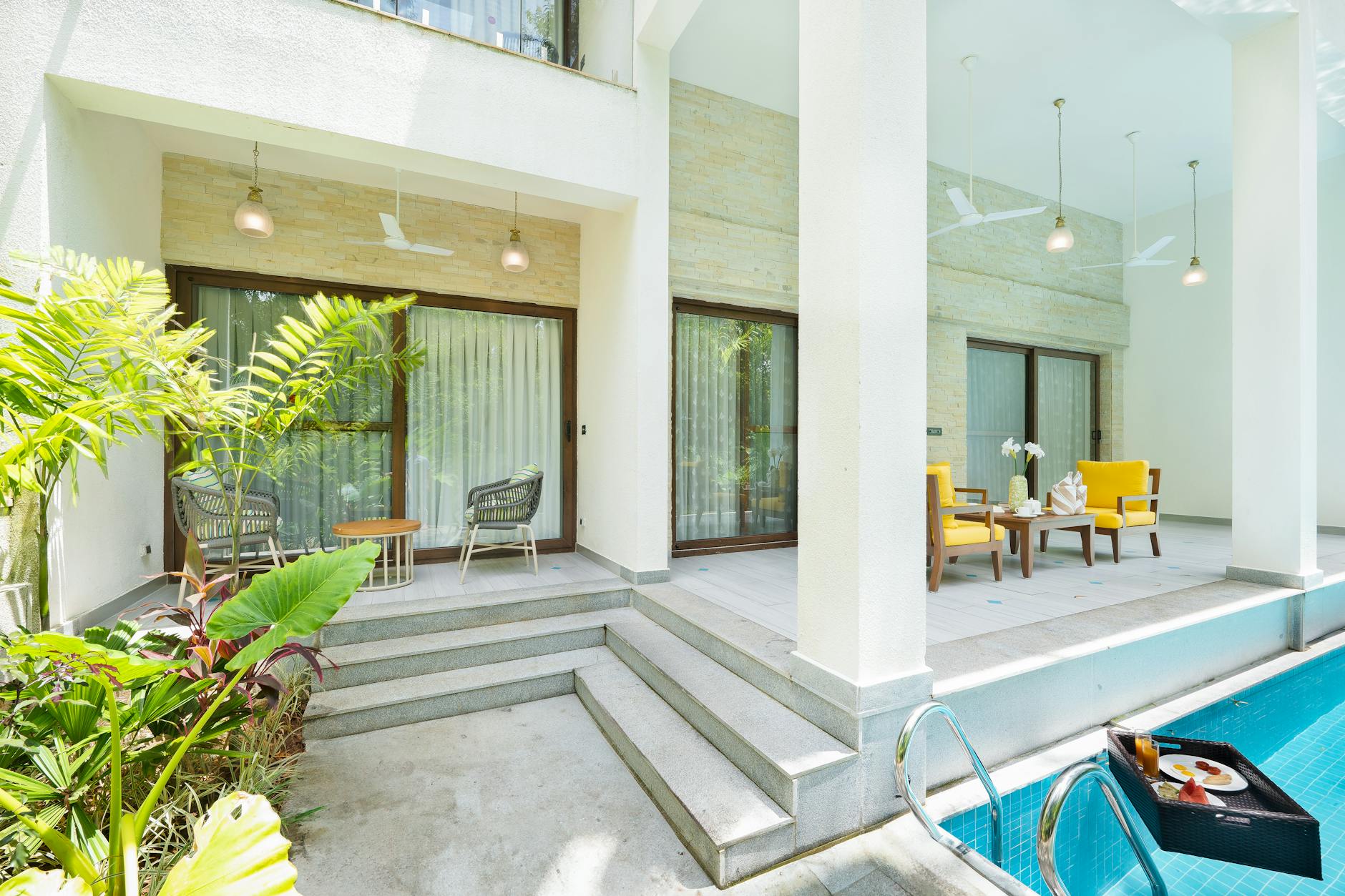 luxurious contemporary villa in goa with poolside patio