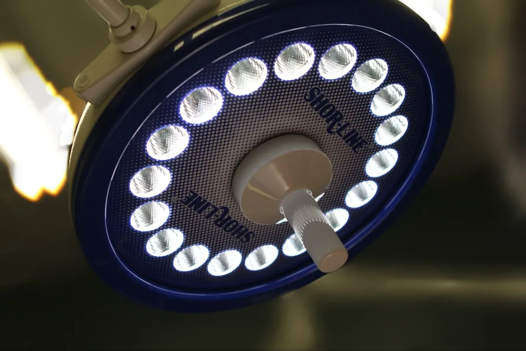 Shoreline LED surgical light fixture with circular ring of bright white LEDs viewed from below