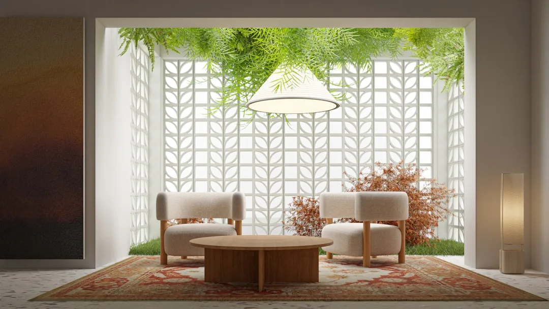 Modern indoor sitting area with open lattice wall blending outdoor garden greenery for seamless indoor-outdoor continuit