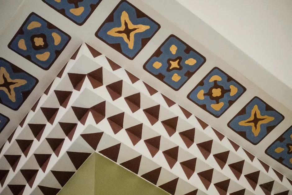 Decorative tile patterns with blue floral motifs and brown triangles on staircase surfaces showing visual scale control