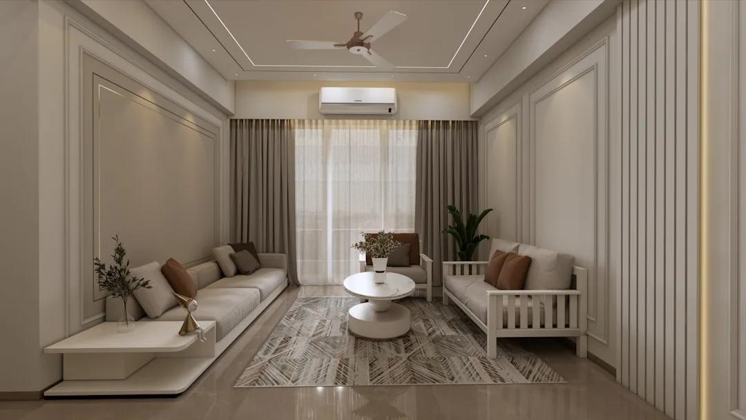 Modern living room with white wall paneling, ceiling moldings, and coordinated furniture in neutral tones