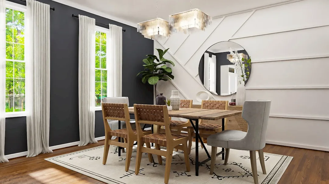 Dining room with two statement chandeliers over rustic wood table, dark accent wall and geometric white panel wall