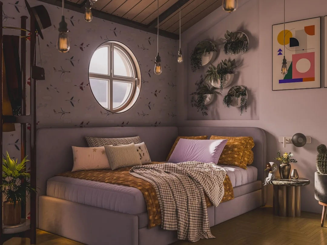 Cozy rental bedroom with pendant lighting, layered bedding, wall-mounted plants and removable decor on purple walls