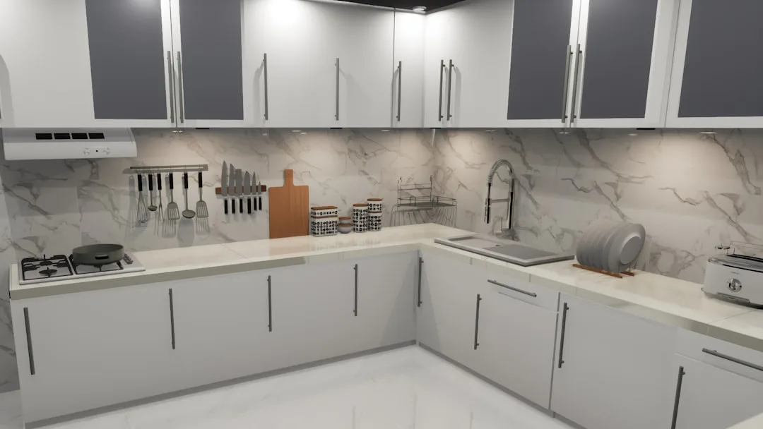 Modern L-shaped kitchen with white lower cabinets, gray upper cabinets, marble backsplash, and stainless steel fixtures