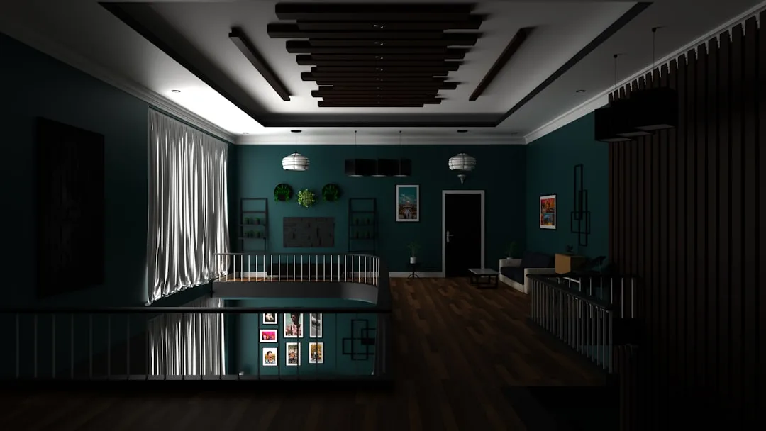 Modern interior with decorative tray ceiling featuring dark wood beams and cove lighting as design focal point