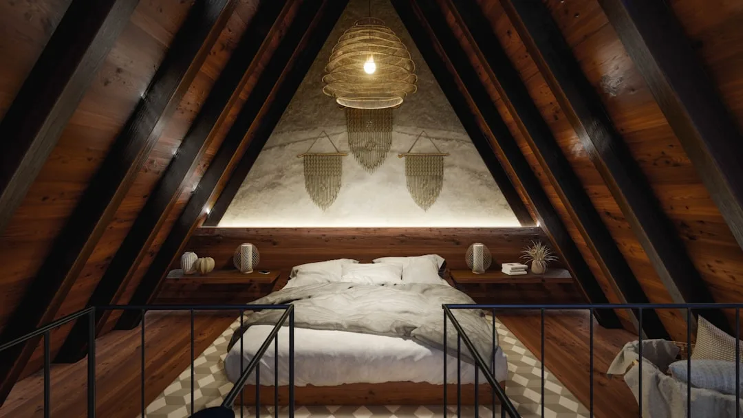 A-frame attic bedroom with wooden beams, loft bed, macrame wall decor, and woven pendant light
