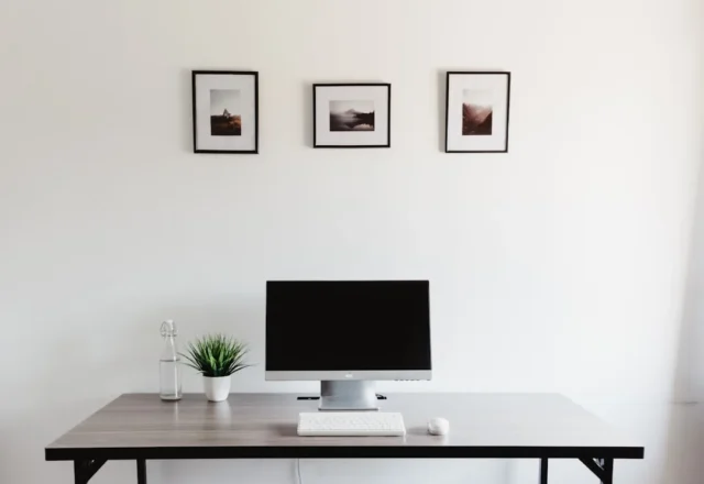 Minimalist freestanding desk with monitor, keyboar