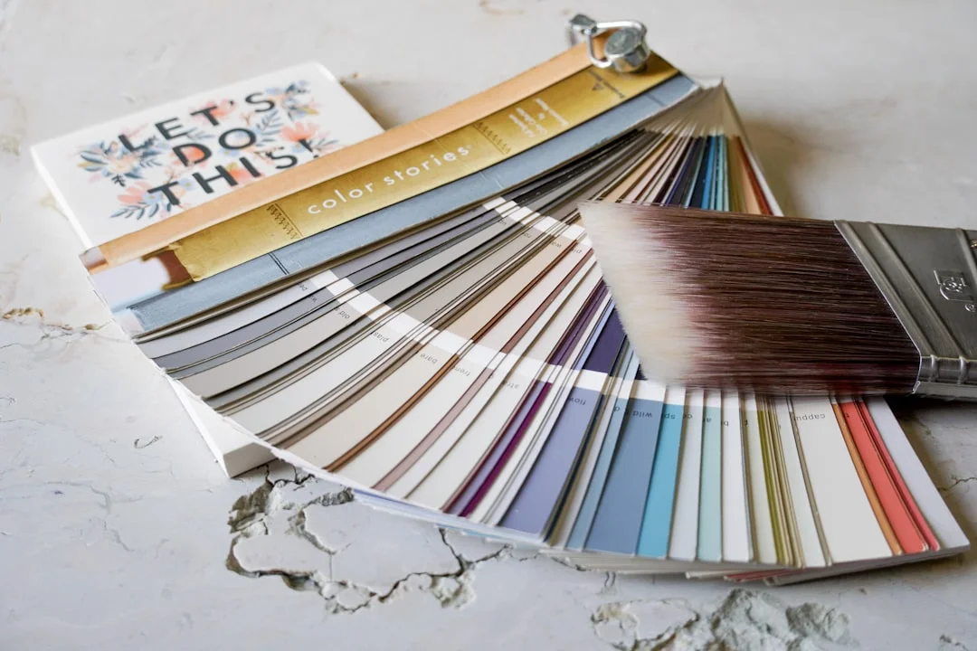 Japandi color palette paint swatches fanned out showing neutrals and muted tones