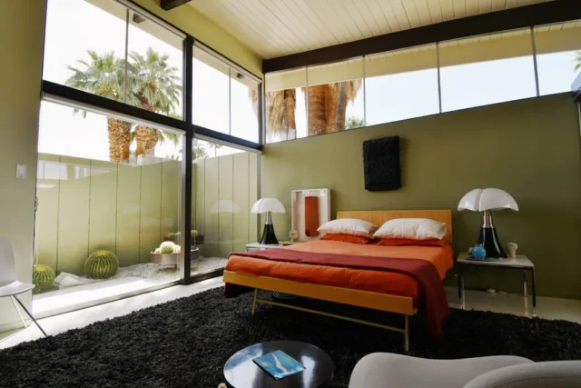 Mid-century modern bedroom with olive green walls,