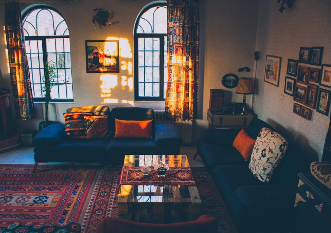 Large sofa and Persian rug scale in small living room layout example