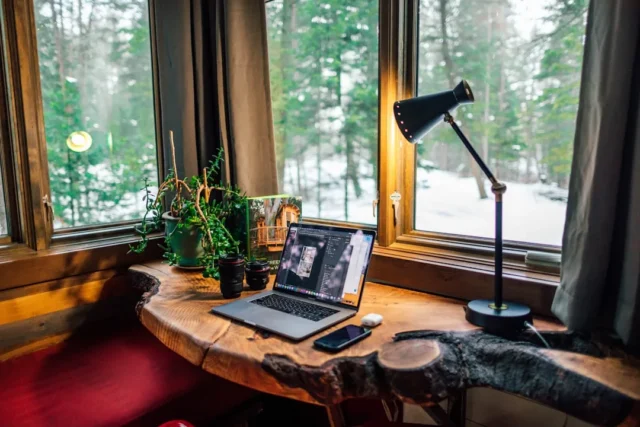 Small home workspace with live-edge wood desk, lap