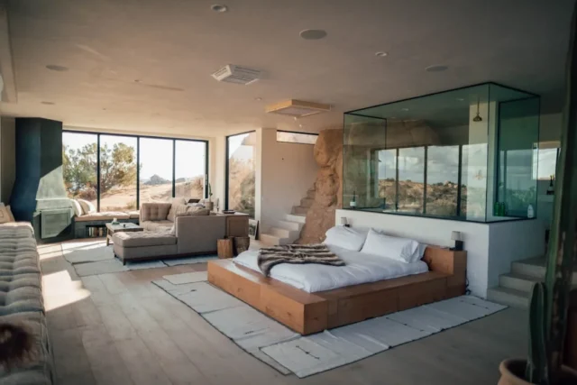 Contemporary mansion bedroom with low platform bed