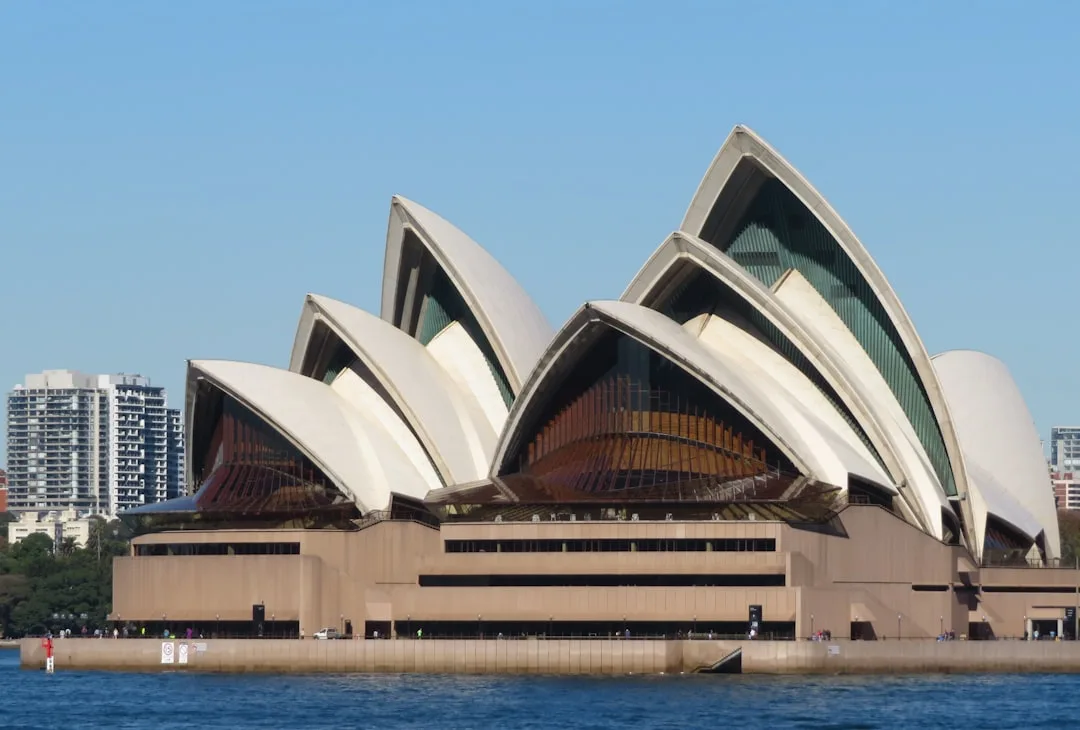 Sydney Opera House iconic sail-shaped architecture viewed from the harbor, a top contender for world's most beautiful bu
