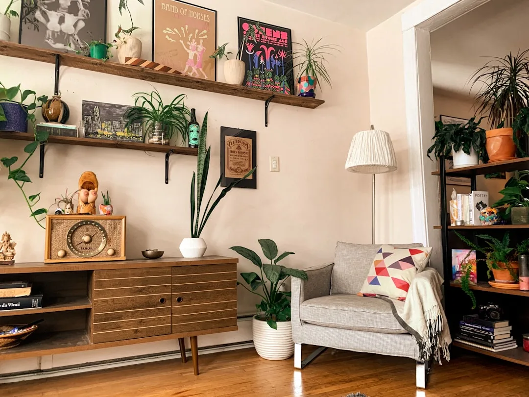 Eclectic first apartment living room with mid-cent