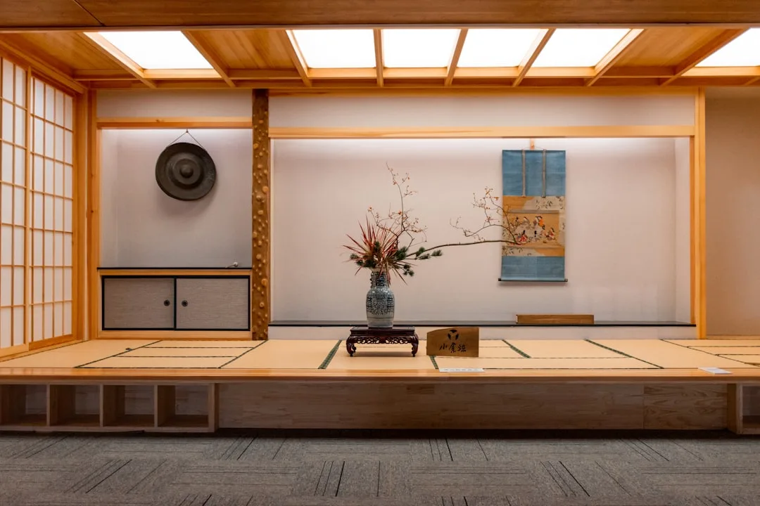 Traditional Japanese tatami room with ikebana flor