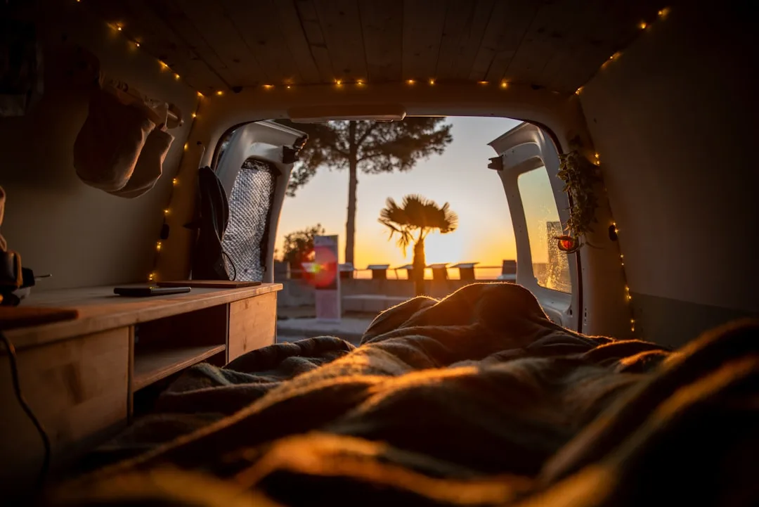 Cozy camper van interior with fairy lights and war