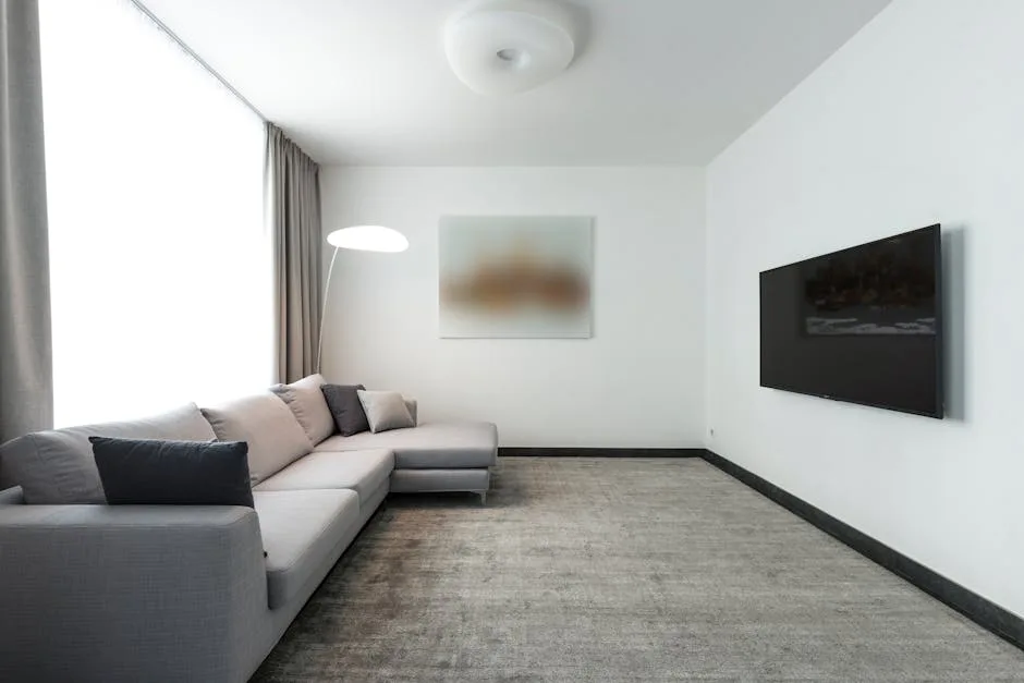 Gray L-shaped sectional sofa in compact minimalist