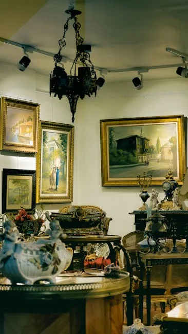 Antique shop interior with gold-framed oil paintin