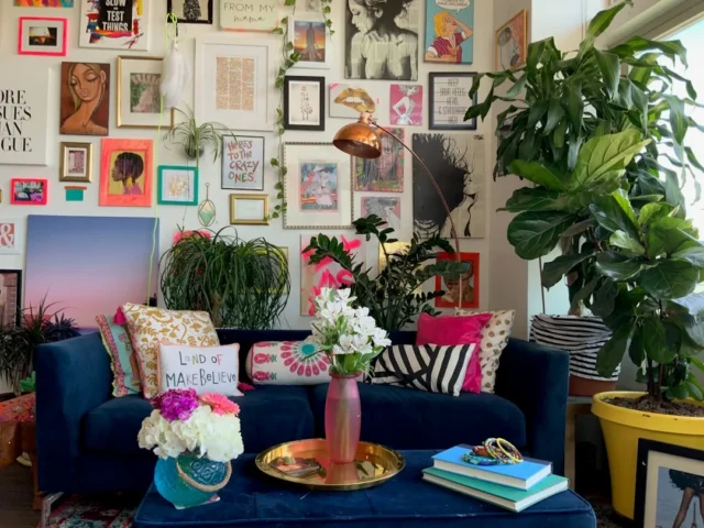 Eclectic boho living room with navy sofa, gallery