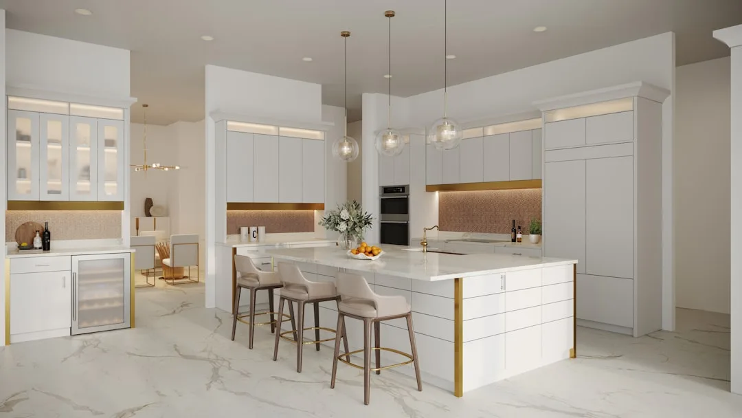 Luxury white kitchen with double island layout, gold accents, marble floors, and bar stools in modern home