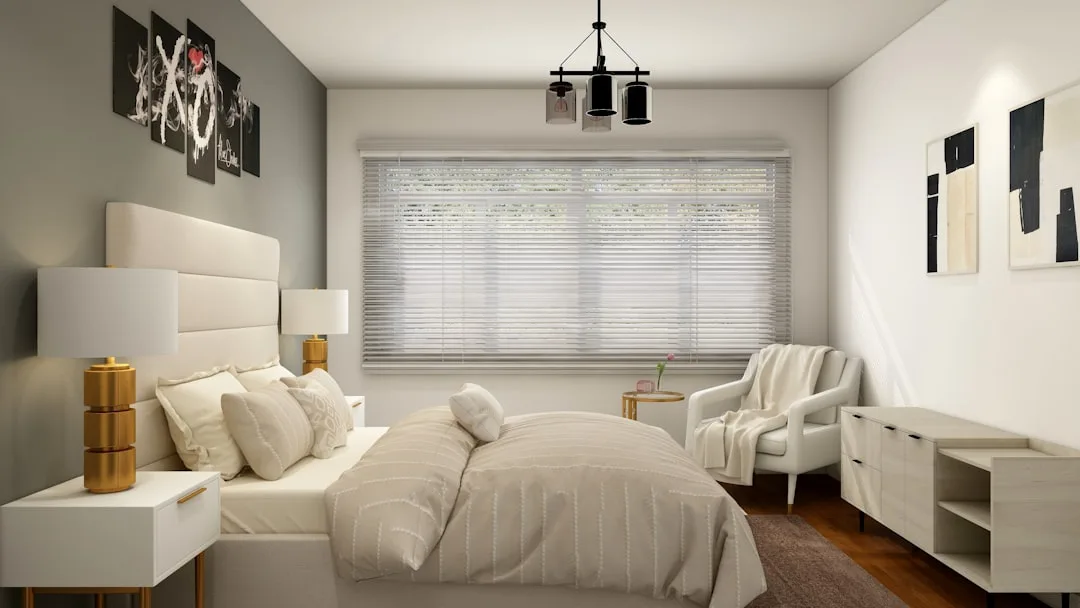 Modern bedroom with nightstands on either side of bed showing table lamp placement at standard sconce height