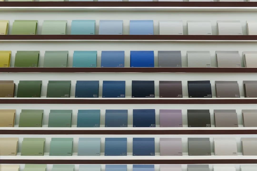 Paint color swatches on display shelves showing fu