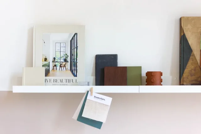 Interior design mood board with wood, slate, and g