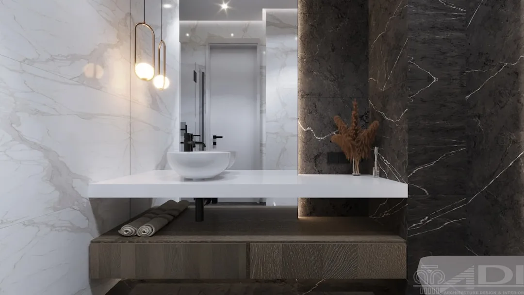 Floating white marble vanity with vessel sink, wood storage bench, and pendant lights in modern luxury bathroom