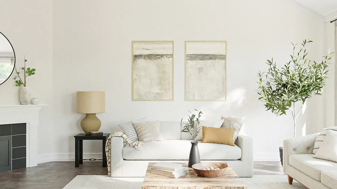 Bright neutral living room with white walls and greige undertones showcasing warm and cool color interactions