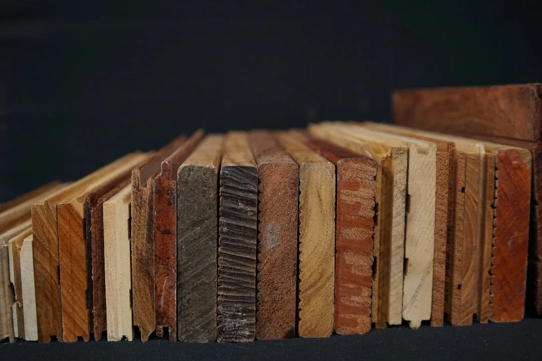 Collection of mismatched wood samples showing different tones, grains, and textures arranged side by side for comparison