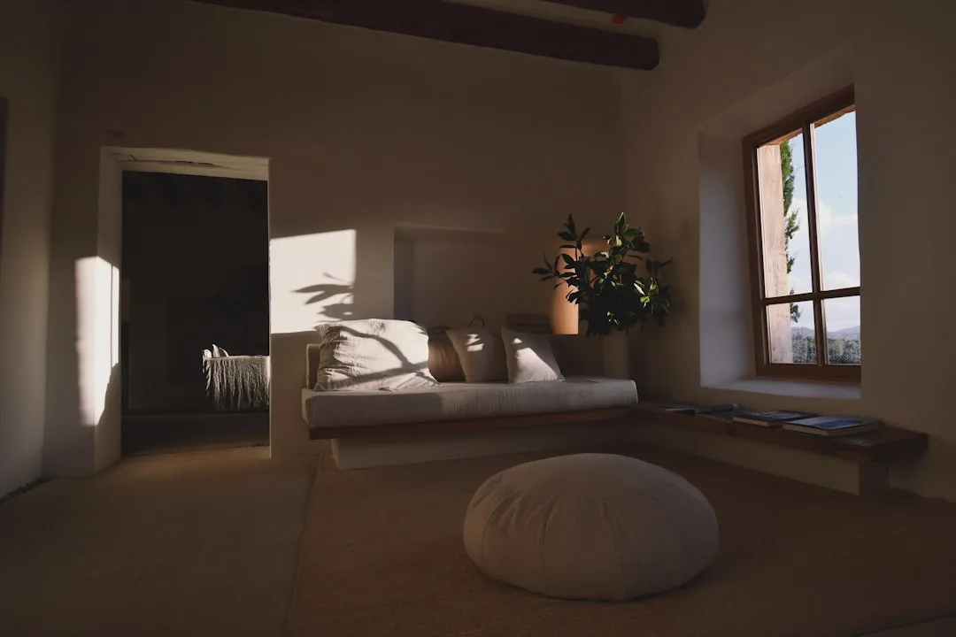 Warm white interior room with natural sunlight cas