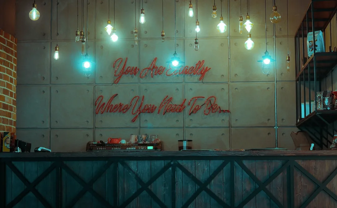 Industrial cafe interior with Edison bulb pendant