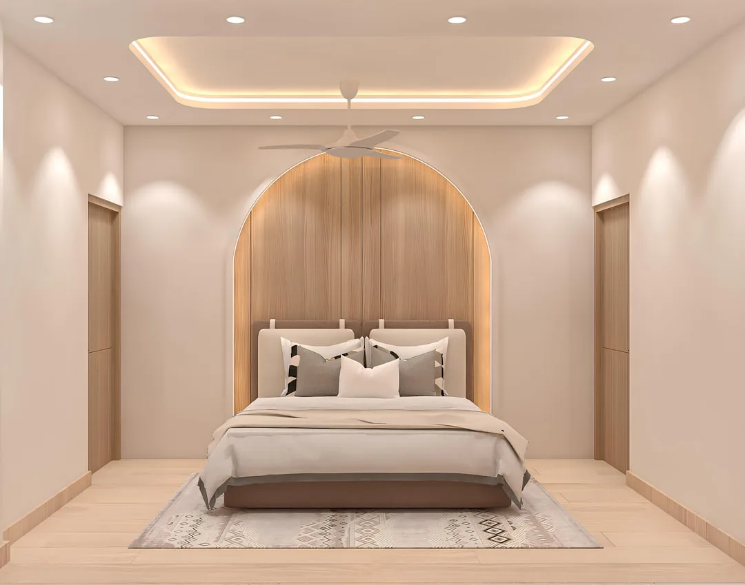 Modern bedroom with layered ambient lighting, rece