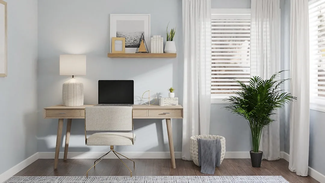 Minimalist floating wood desk with laptop and lamp