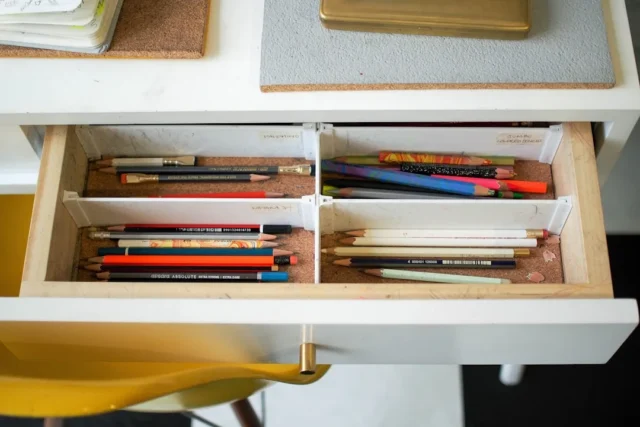 Organized home office desk drawer with dividers se