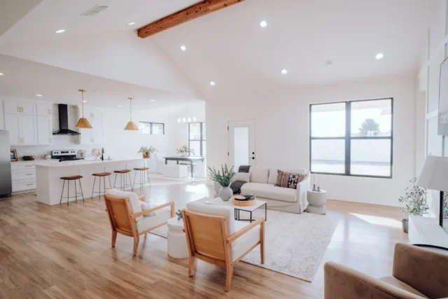 Open floor plan living room and kitchen with white