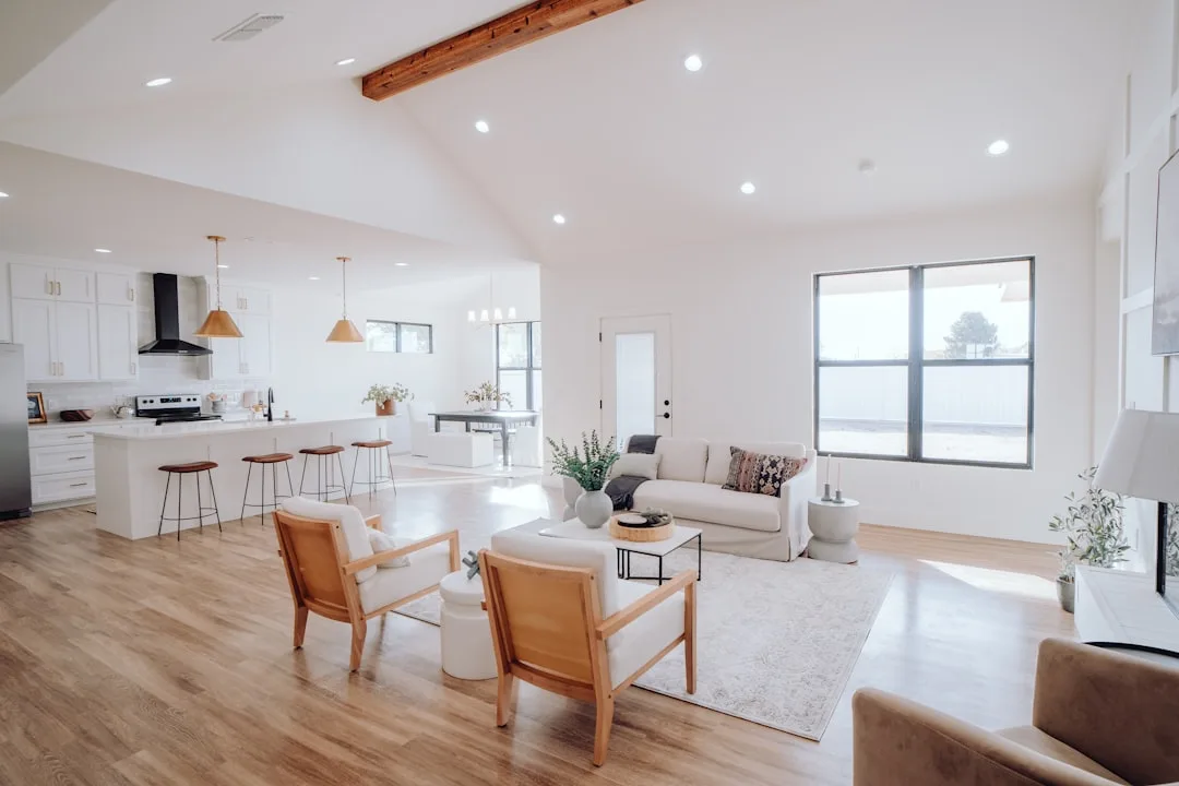 Open floor plan living room and kitchen with white