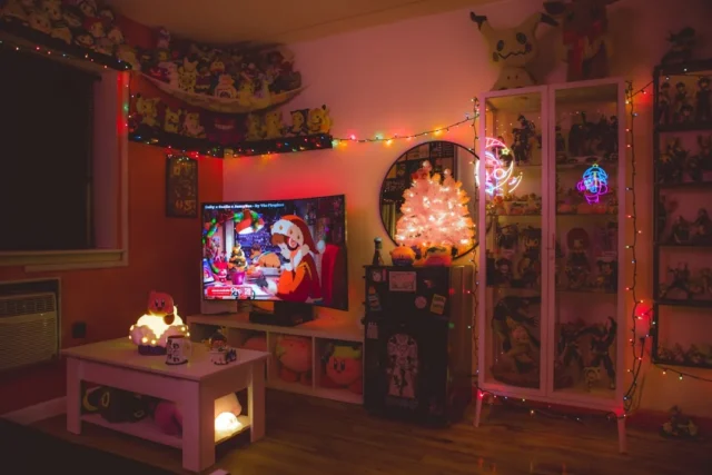 Cluttered anime collectibles and Christmas lights
