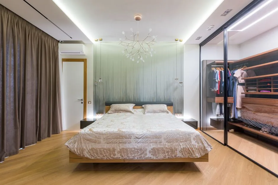 Modern bedroom with floating wood bed, decorative