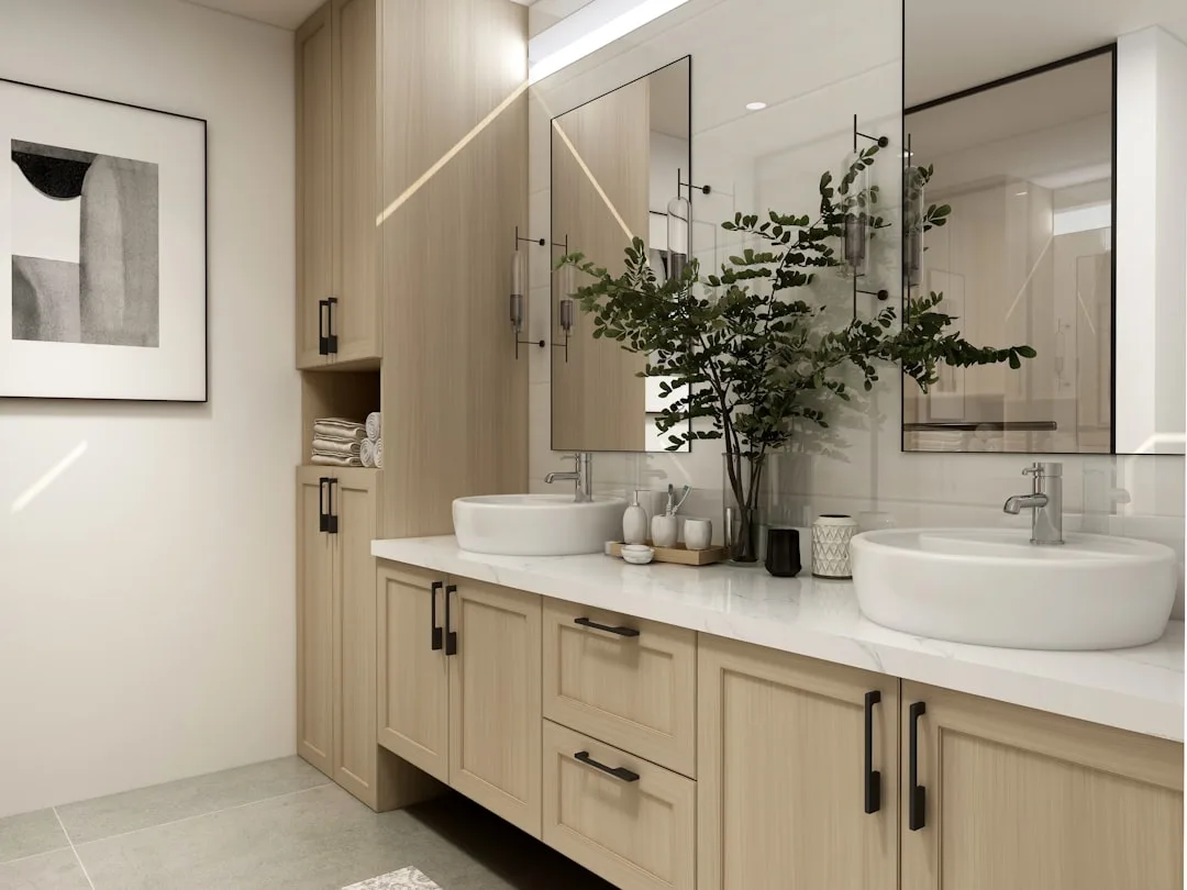 Modern bathroom double vanity with wood cabinets, marble countertop, vessel sinks, and built-in storage shelves